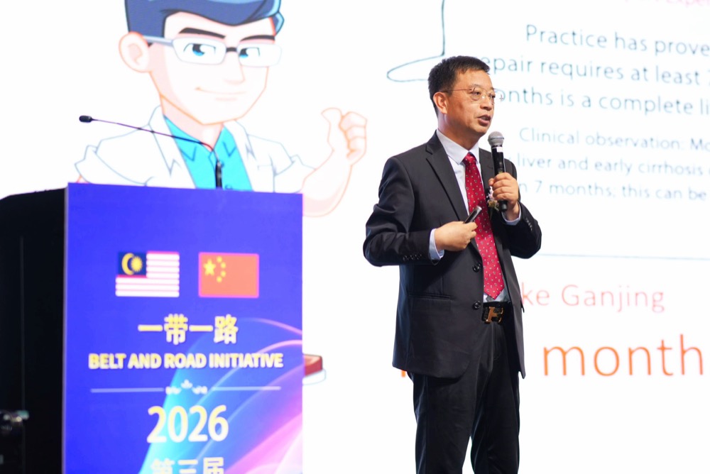 Expert delivering a clinical lecture on liver health